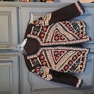 Like new fun jacket. Gorgeous detailing